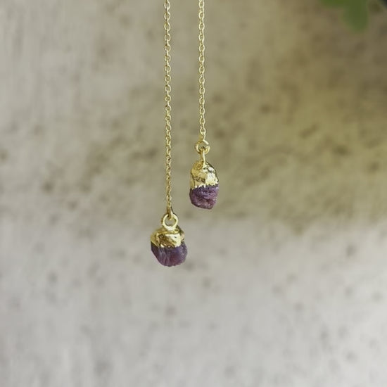 Dainty ruby threader earrings featuring small red gemstones on a thin gold chain