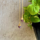 Dainty ruby threader earrings featuring small red gemstones on a thin gold chain